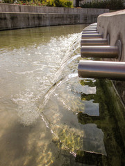 Flowing water from pipes (upper view).