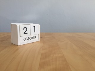 October 21st .October 21 white wooden calendar on vintage wood a