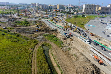 Tyumen, Russia - July 27, 2016: Construction of two-level outcome on bypass road on Fedyuninskogo and Melnikayte streets intersection