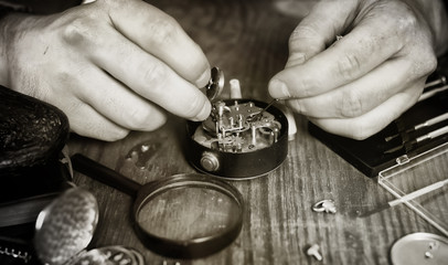 black and white photo watch clock repairing