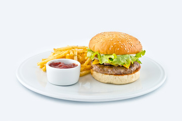 mouth watering Burger with fries and tomato sauce