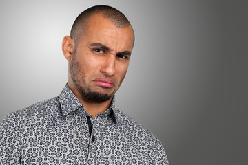 Obraz premium Handsome business man with a depressed expression