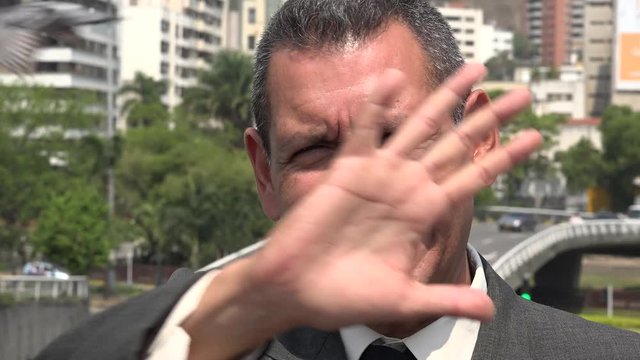 Upset Hispanic Business Man Complaining