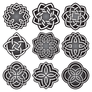 Set of logo symbols in Celtic knots style. Tribal tattoo symbols package. Nine silver stamps for jewelry design. Monochrome logos design elements.