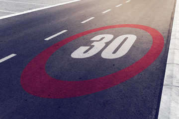 30 kmph or mph driving speed limit sign on highway