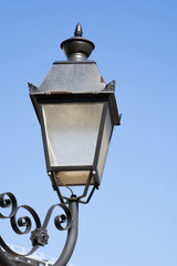 Fototapeta na wymiar Old Street light on sky background
