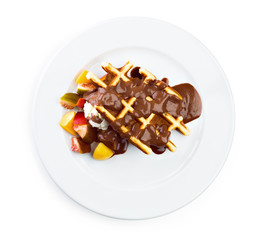 Belgium waffles with fresh berries and chocolate sauce