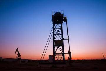 The silhouette of tower type pumping unit