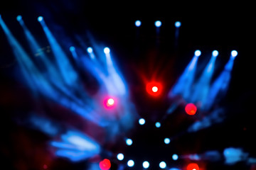 Fototapeta na wymiar Defocused entertainment concert lighting on stage, bokeh