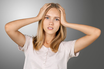 Fototapeta premium Young blonde tired woman