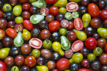 Fototapeta na wymiar small cherry tomatoes, different colors