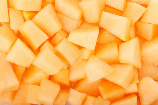 Cantaloupe melon pieces texture background