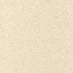 Natural decorative recycled paper texture. Beige, yellow space background.