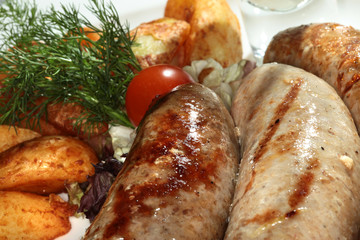 kupaty with potatoes