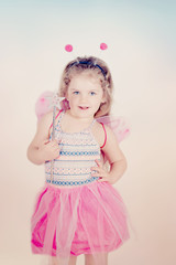 
beautiful little girl in butterfly costume
