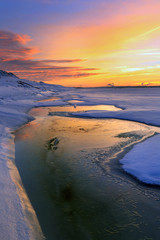Sunset on the winter river