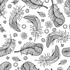 Seamless pattern feathers. Doodle, stylized image of bird feathers. Bo-ho style. Template for printing onto fabric, wrapping paper, textiles.