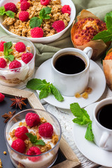 Breakfast concept. Coffee muesli granola berries homemade yogurt