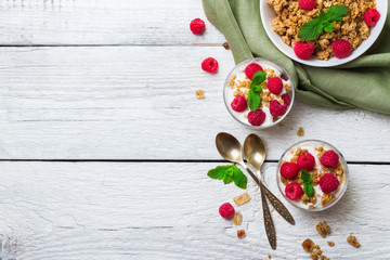 Breakfast concept. Muesli granola berries homemade yogurt