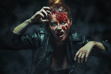 Close-up portrait of horrible zombie woman. Horror. Halloween