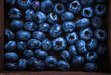Blueberries in wooden rustic box