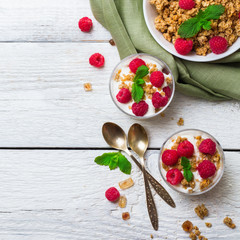 Breakfast concept. Muesli granola berries homemade yogurt