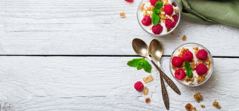 Breakfast concept. Muesli granola berries homemade yogurt