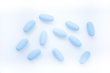 blue medical pills on white