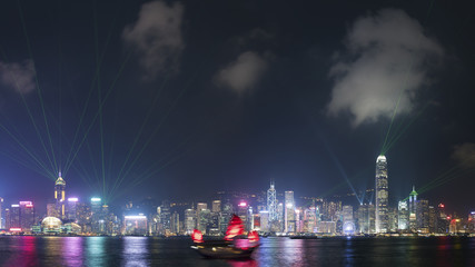 Fototapeta na wymiar Laser show in Victoria Harbor of Hong Kong city at night
