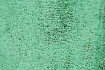 Old wooden boards painted green paint