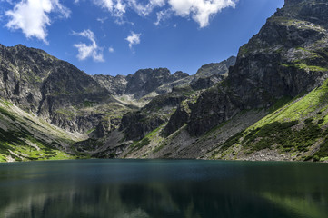Fototapeta na wymiar Beautiful view of the mountain lake in the High Tatras. Poland