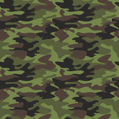 Fototapeta premium Camouflage pattern background seamless vector illustration. Classic clothing style masking camo repeat print. Green brown black olive colors forest texture