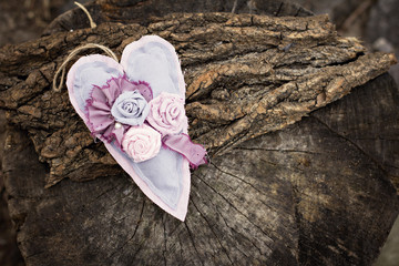 Hand-made hearts  on the old board