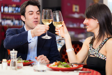 Couple drinking wine in a restaurant