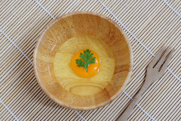 Fresh eggs on a wooden rustic background