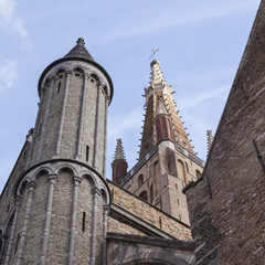 Fototapeta premium towers of onze lieve vrouw in the old city of bruges in flanders
