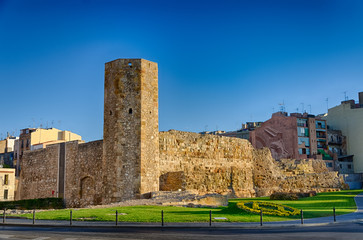 Fototapeta na wymiar Ancient roman tower in sunrise light Tarragona, Spain