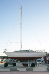 Trailer towing a sailboat