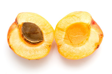 yellow apricots on a white background