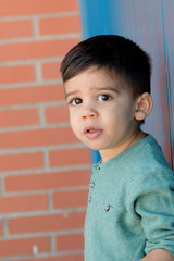 Cheerful child with two years on the street