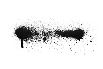 Black color spray paint on a white background paper