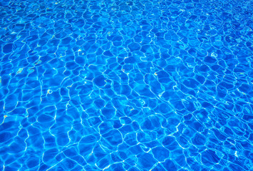 Sunlit water in a water pool texture or background