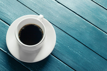 coffee mug on a dark wooden table