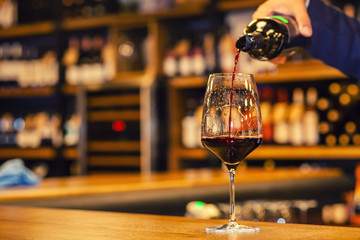 Pouring red wine