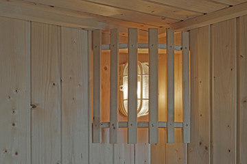 lamp on wall in sauna room