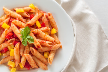 Penne with tomato sauce and fresh pepper