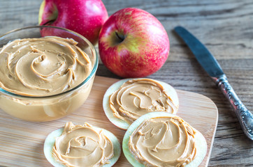 Slices of apples with peanut butter
