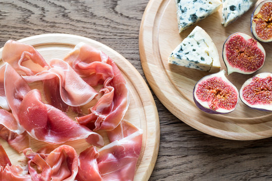 Slices of jamon with blue cheese and figs