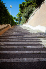Look from below at white stairs leading to the park