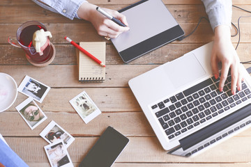 Illustrator working at home using a graphics tablet